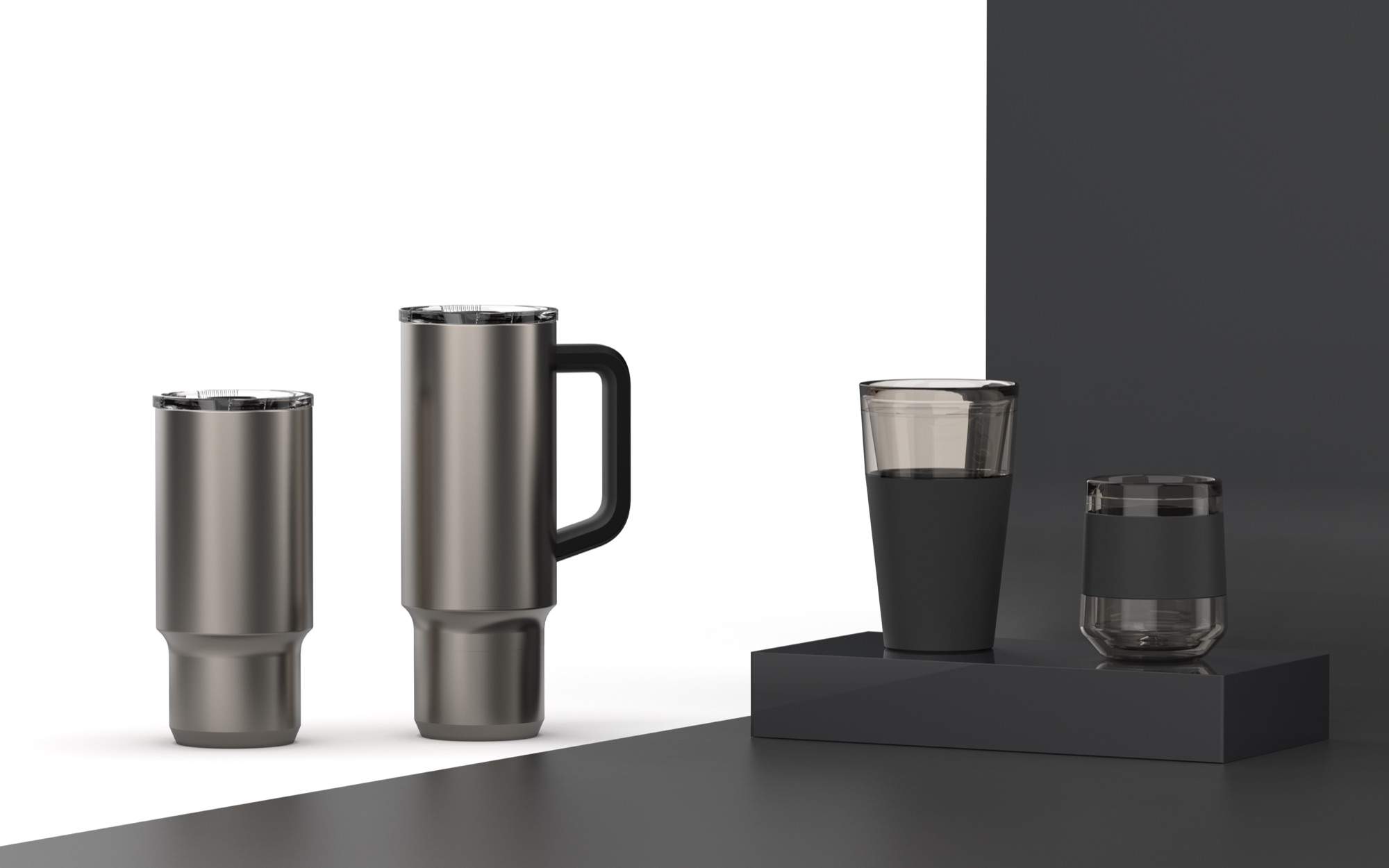 Set of five modern drinkware vessels, including a tumbler, a travel mug, a glass with black sleeve, and a small glass with black sleeve, arranged on a black platform, with a contrasting background divided into white and dark gray sections.