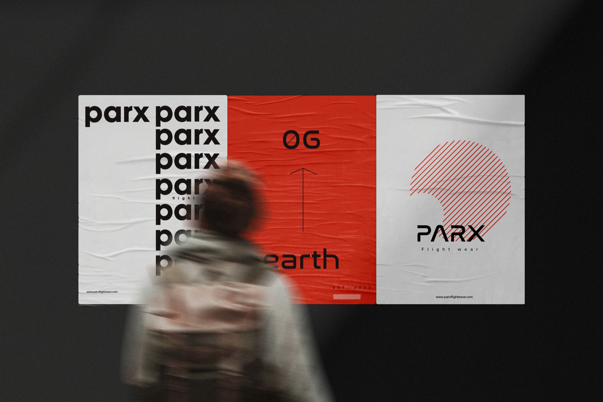 A person in motion walking past a large billboard advertisement for 'Parx Flight Wear', featuring a repeated 'parx' logo on the left, a red rectangle with the text 'Earth' and a measurement arrow in the middle, and a gray section on the right with a stylized red globe and the 'Parx' logo.